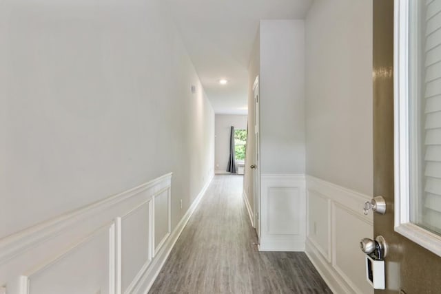 1360 Sugar Glen Ct, Lawrenceville, GA 30044 - corridor with a wainscoted wall, wood finished floors, a decorative wall, an upstairs landing, and recessed lighting
