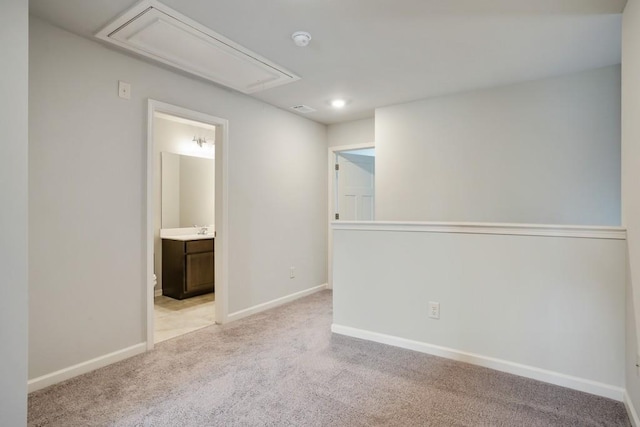 1360 Sugar Glen Ct, Lawrenceville, GA 30044 - unfurnished room featuring attic access, carpet flooring, a smoke detector, baseboards, and a sink
