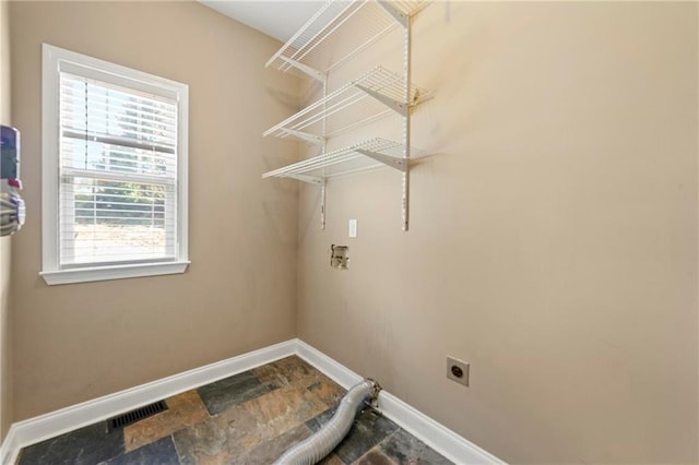 washroom featuring hookup for a washing machine and hookup for an electric dryer