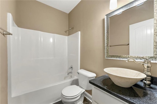 full bathroom featuring  shower combination, vanity, and toilet