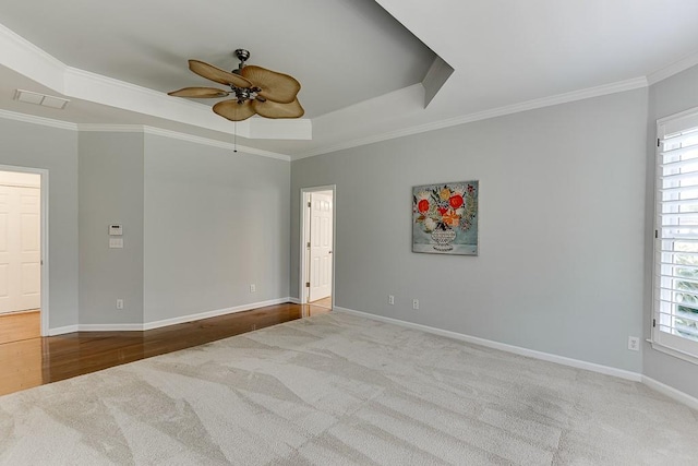 7405 Brookstone Way, Flowery Branch, GA 30542 - carpeted spare room with a raised ceiling, crown molding, and ceiling fan