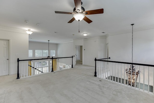 7405 Brookstone Way, Flowery Branch, GA 30542 - spare room with ornamental molding, ceiling fan, and carpet