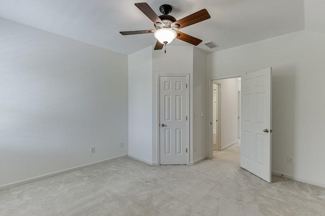 7405 Brookstone Way, Flowery Branch, GA 30542 - unfurnished bedroom with light colored carpet, lofted ceiling, and a ceiling fan