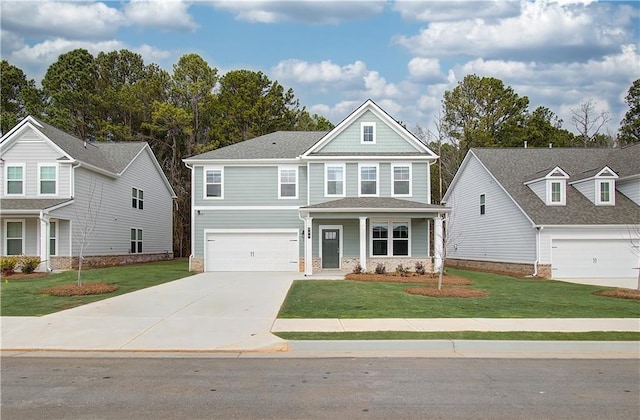 251 Arnewood Cir, Mcdonough, GA 30253 - craftsman house featuring driveway, a front yard, and an attached garage