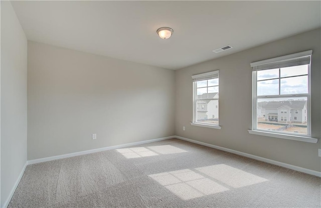 251 Arnewood Cir, Mcdonough, GA 30253 - spare room featuring light colored carpet and baseboards
