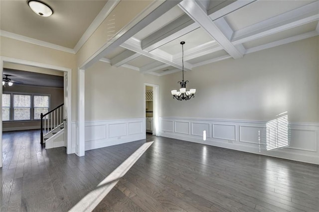 unfurnished room featuring beamed ceiling, coffered ceiling, dark wood-type flooring, and ceiling fan with notable chandelier