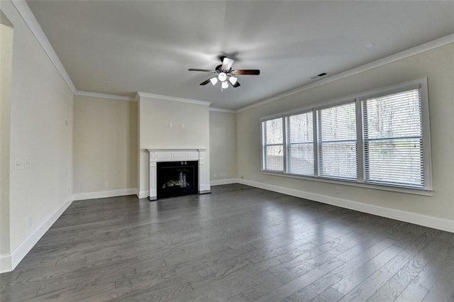 unfurnished living room with crown molding, dark hardwood / wood-style floors, and ceiling fan