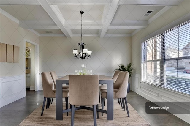 dining space with an inviting chandelier, coffered ceiling, beam ceiling, and dark tile patterned floors