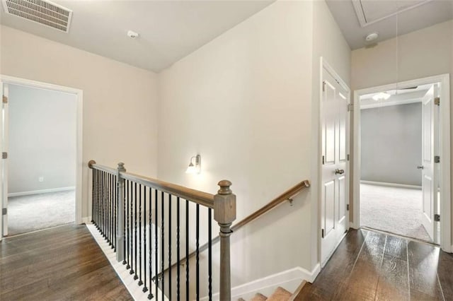 119 Hardy Water Dr, Lawrenceville, GA 30045 - hall with attic access, an upstairs landing, wood finished floors, and baseboards