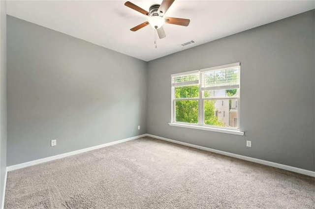 119 Hardy Water Dr, Lawrenceville, GA 30045 - carpeted spare room with baseboards and a ceiling fan