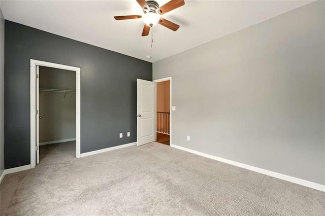 119 Hardy Water Dr, Lawrenceville, GA 30045 - unfurnished bedroom featuring carpet floors, baseboards, a closet, and a ceiling fan
