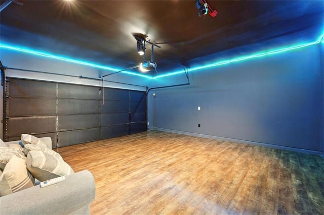 119 Hardy Water Dr, Lawrenceville, GA 30045 - garage with a garage door opener and baseboards