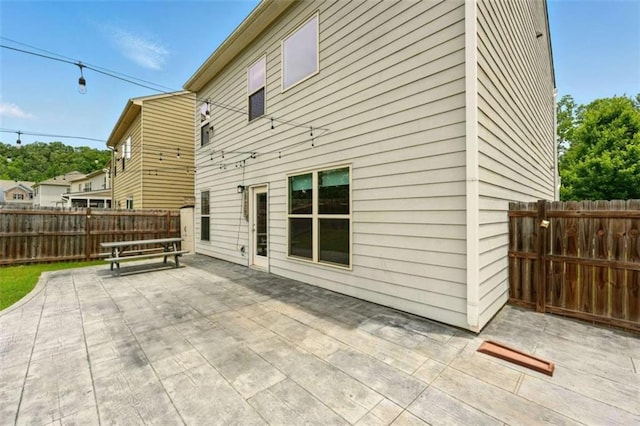119 Hardy Water Dr, Lawrenceville, GA 30045 - back of house with a patio