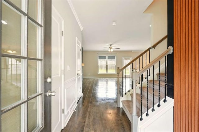 119 Hardy Water Dr, Lawrenceville, GA 30045 - entryway with dark wood-style flooring, stairway, a ceiling fan, baseboards, and ornamental molding