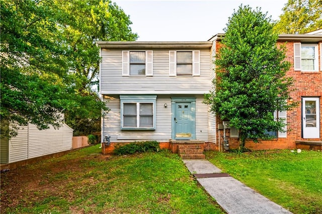 1406 Springleaf Cir SE, Smyrna, GA 30080 - townhome / multi-family property with a front lawn
