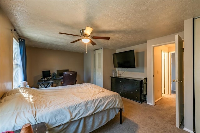 1406 Springleaf Cir SE, Smyrna, GA 30080 - carpeted bedroom with a textured ceiling, ceiling fan, baseboards, and a closet