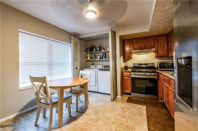 1406 Springleaf Cir SE, Smyrna, GA 30080 - kitchen with appliances with stainless steel finishes, washer and clothes dryer, under cabinet range hood, brown cabinetry, and a textured ceiling