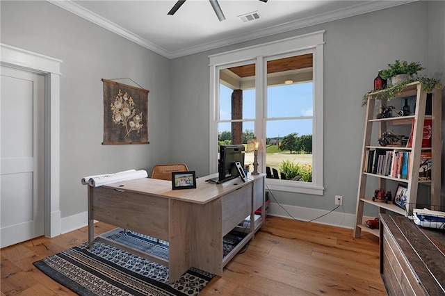 office space featuring hardwood / wood-style flooring, ornamental molding, and ceiling fan