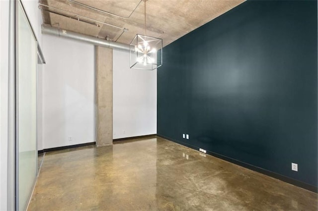 660 Glen Iris Drive # 206 & 109, Atlanta, GA 30308 - bedroom with finished concrete floors, baseboards, and a chandelier