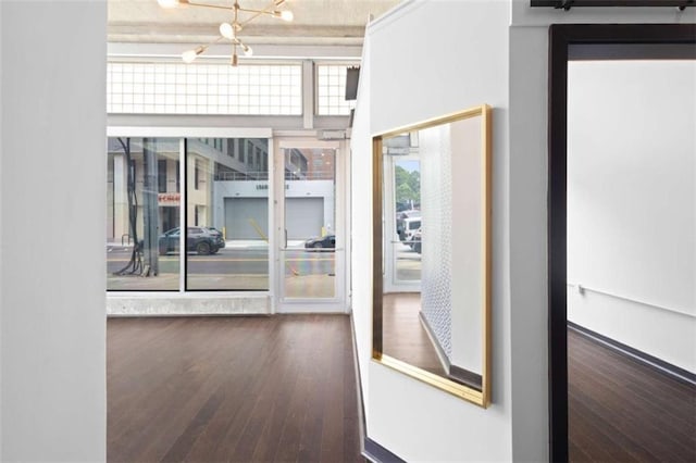 660 Glen Iris Drive # 206 & 109, Atlanta, GA 30308 - unfurnished room with wood finished floors and a chandelier