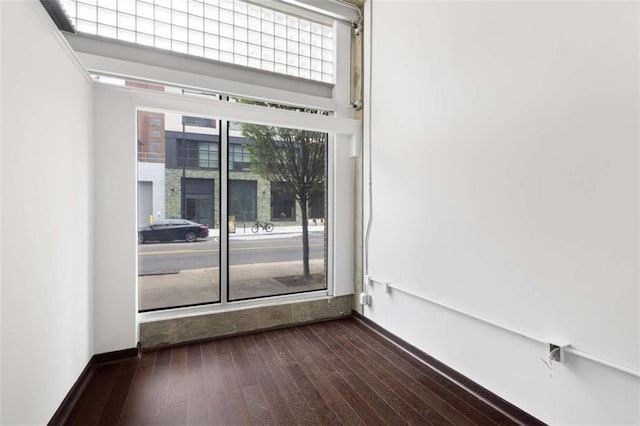 660 Glen Iris Drive # 206 & 109, Atlanta, GA 30308 - unfurnished room with dark wood-style flooring and baseboards