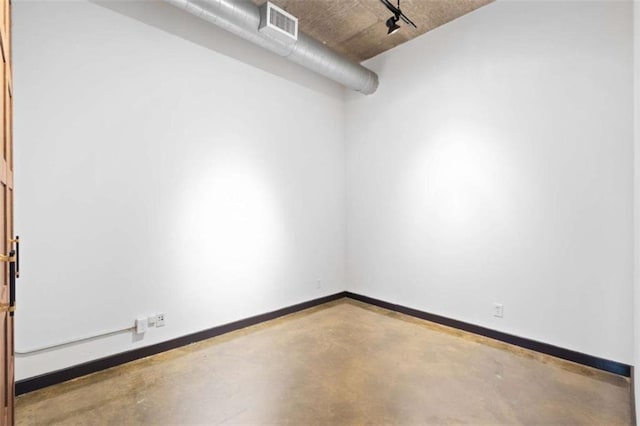 660 Glen Iris Drive # 206 & 109, Atlanta, GA 30308 - unfurnished room featuring finished concrete flooring, baseboards, and track lighting