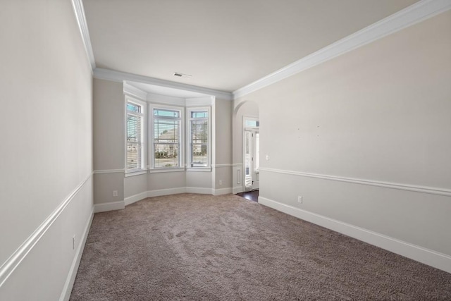 carpeted empty room with crown molding