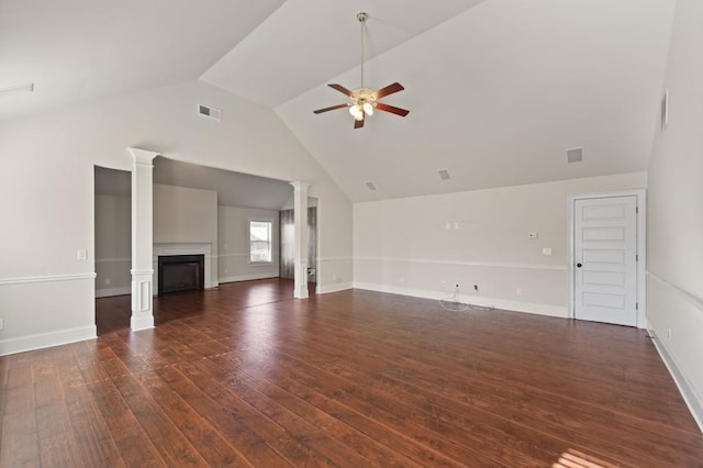 unfurnished living room with ceiling fan, lofted ceiling, and dark wood-type flooring