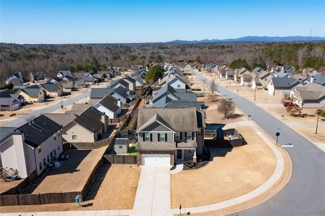 birds eye view of property featuring a residential view and a mountain view