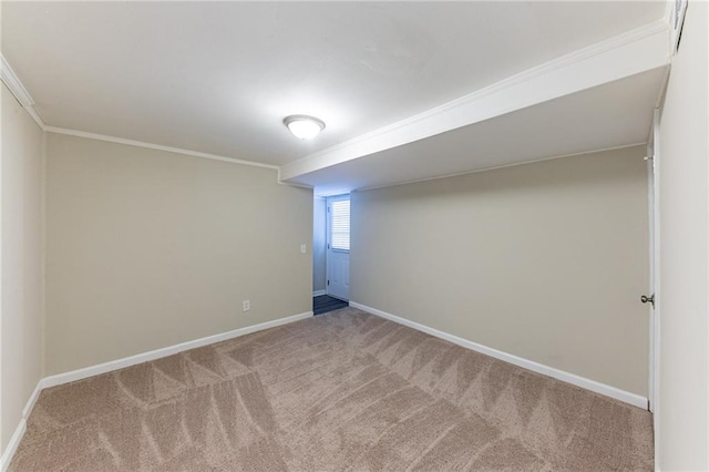 carpeted empty room featuring ornamental molding