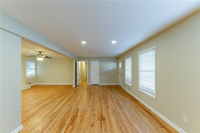 interior space featuring ceiling fan and light wood-type flooring