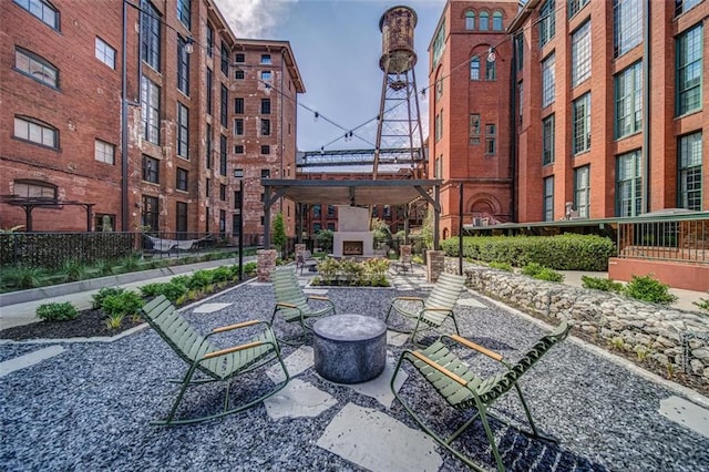 view of home's community with a patio area