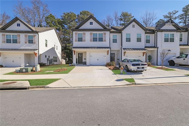 multi unit property featuring a garage