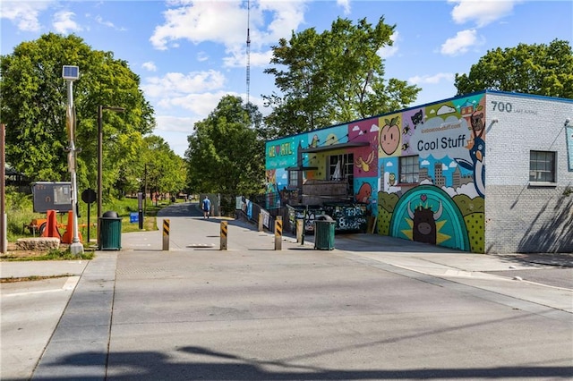 view of street featuring curbs and sidewalks