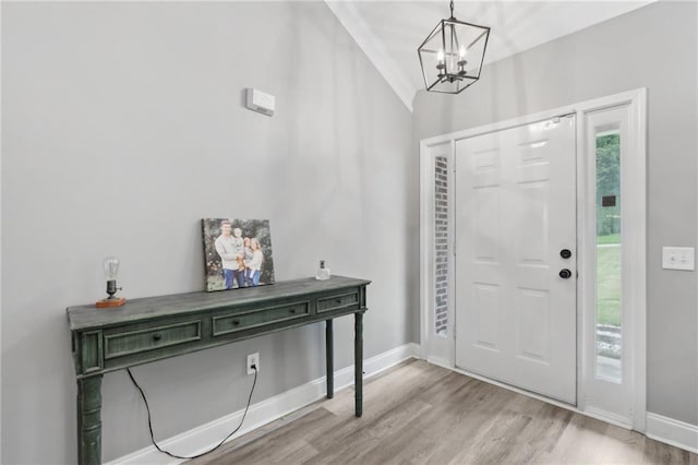 219 Summit Chase Dr, Jefferson, GA 30549 - foyer entrance with a chandelier, light wood-style flooring, and baseboards
