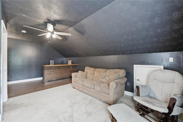 219 Summit Chase Dr, Jefferson, GA 30549 - sitting room featuring vaulted ceiling, a ceiling fan, baseboards, wood finished floors, and carpet floors