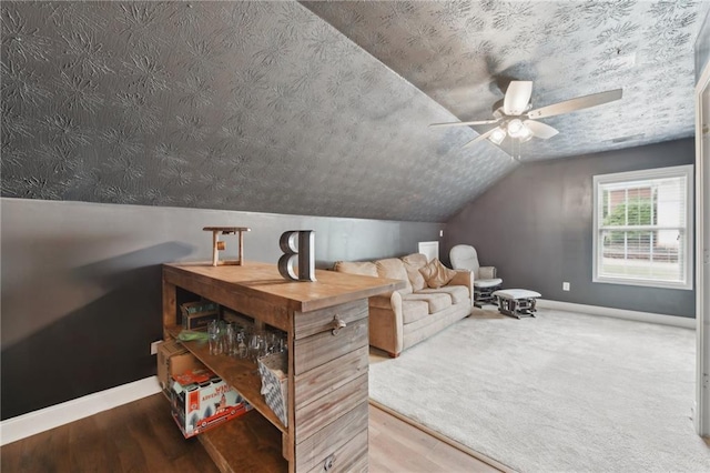 219 Summit Chase Dr, Jefferson, GA 30549 - living area featuring baseboards, a ceiling fan, lofted ceiling, and wood finished floors