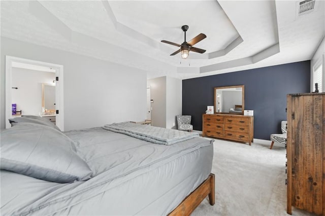 219 Summit Chase Dr, Jefferson, GA 30549 - bedroom featuring a tray ceiling, light carpet, and ceiling fan