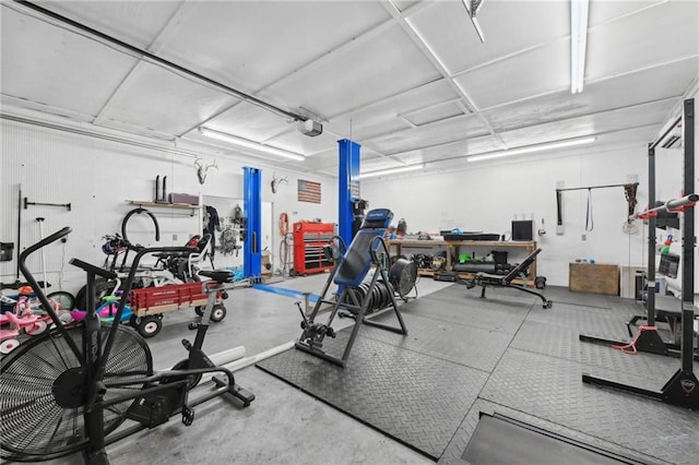 219 Summit Chase Dr, Jefferson, GA 30549 - garage featuring a garage door opener and a workshop area