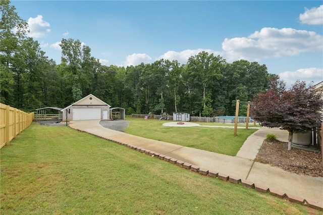 219 Summit Chase Dr, Jefferson, GA 30549 - view of yard with a garage and an outbuilding
