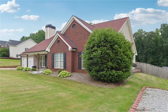 219 Summit Chase Dr, Jefferson, GA 30549 - view of front of house with brick siding, a garage, and a chimney