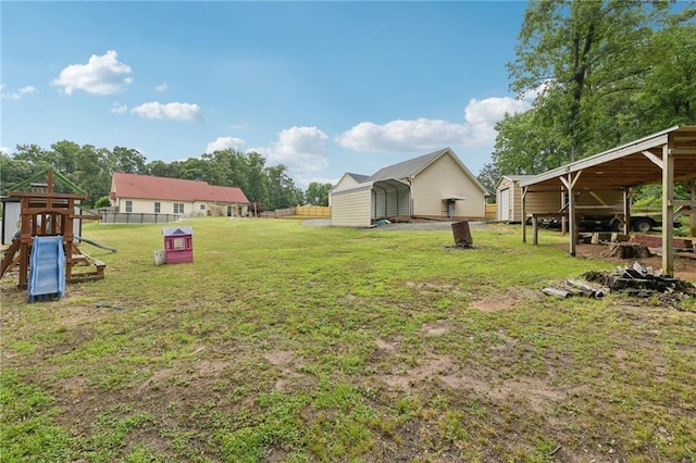 219 Summit Chase Dr, Jefferson, GA 30549 - view of yard with a carport, an outdoor structure, and a playground