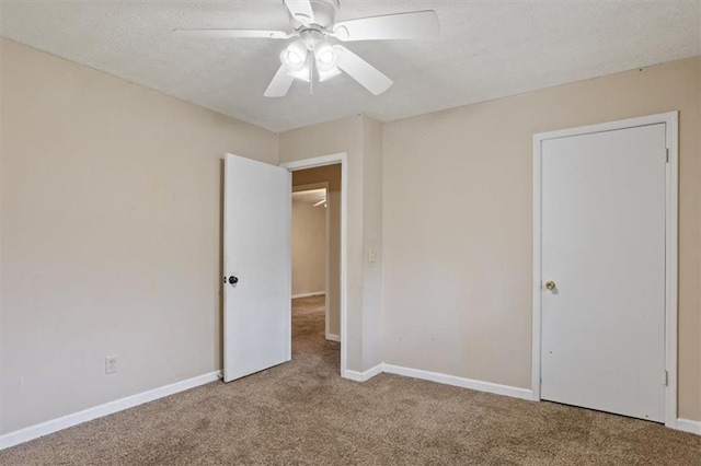 1513 Dupree Rd, Woodstock, GA 30189 - unfurnished bedroom featuring carpet floors, a textured ceiling, and ceiling fan