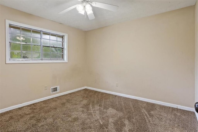 1513 Dupree Rd, Woodstock, GA 30189 - carpeted empty room with baseboards and a ceiling fan