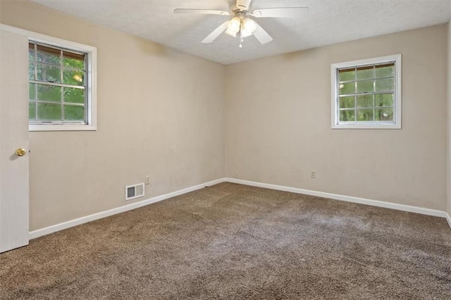 1513 Dupree Rd, Woodstock, GA 30189 - carpeted empty room with a ceiling fan and a textured ceiling