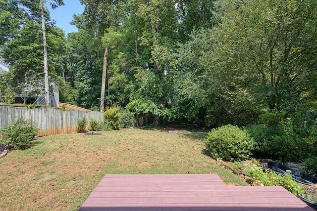 view of yard featuring a deck