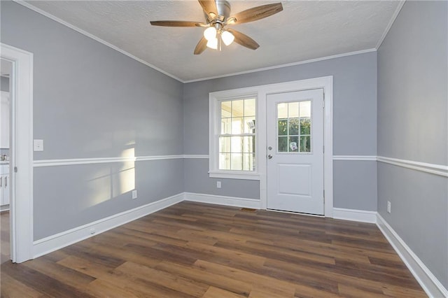 doorway to outside with crown molding, ceiling fan, dark hardwood / wood-style floors, and a textured ceiling