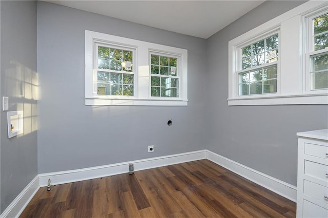 empty room with dark hardwood / wood-style floors