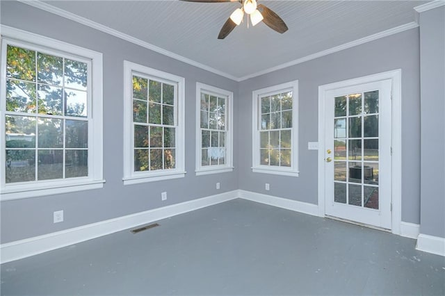 unfurnished sunroom featuring ceiling fan