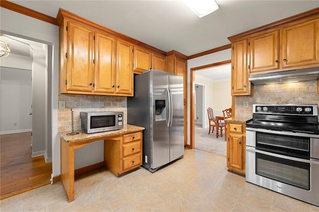 kitchen with stainless steel appliances, crown molding, light stone countertops, and backsplash